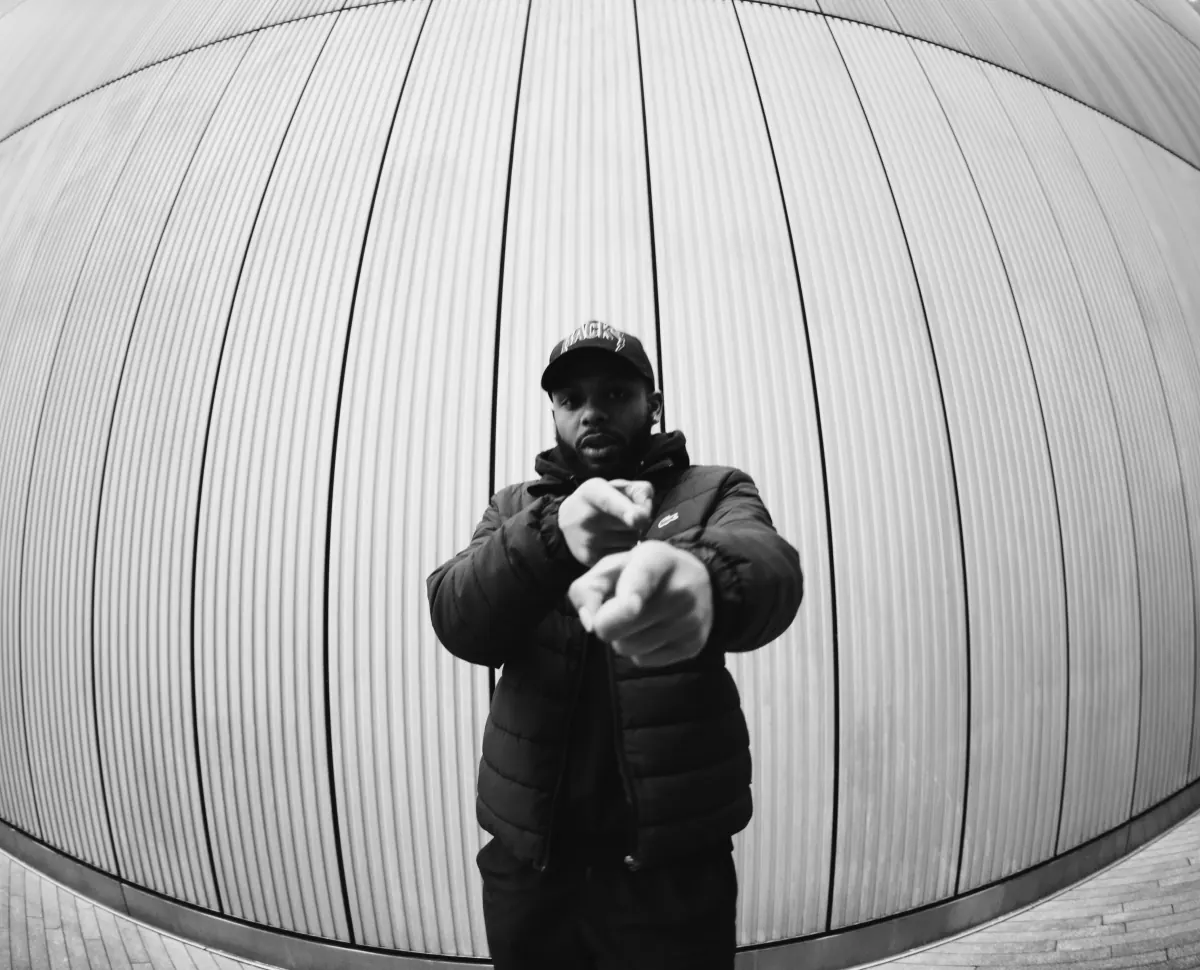 Snowy standing in a tunnel